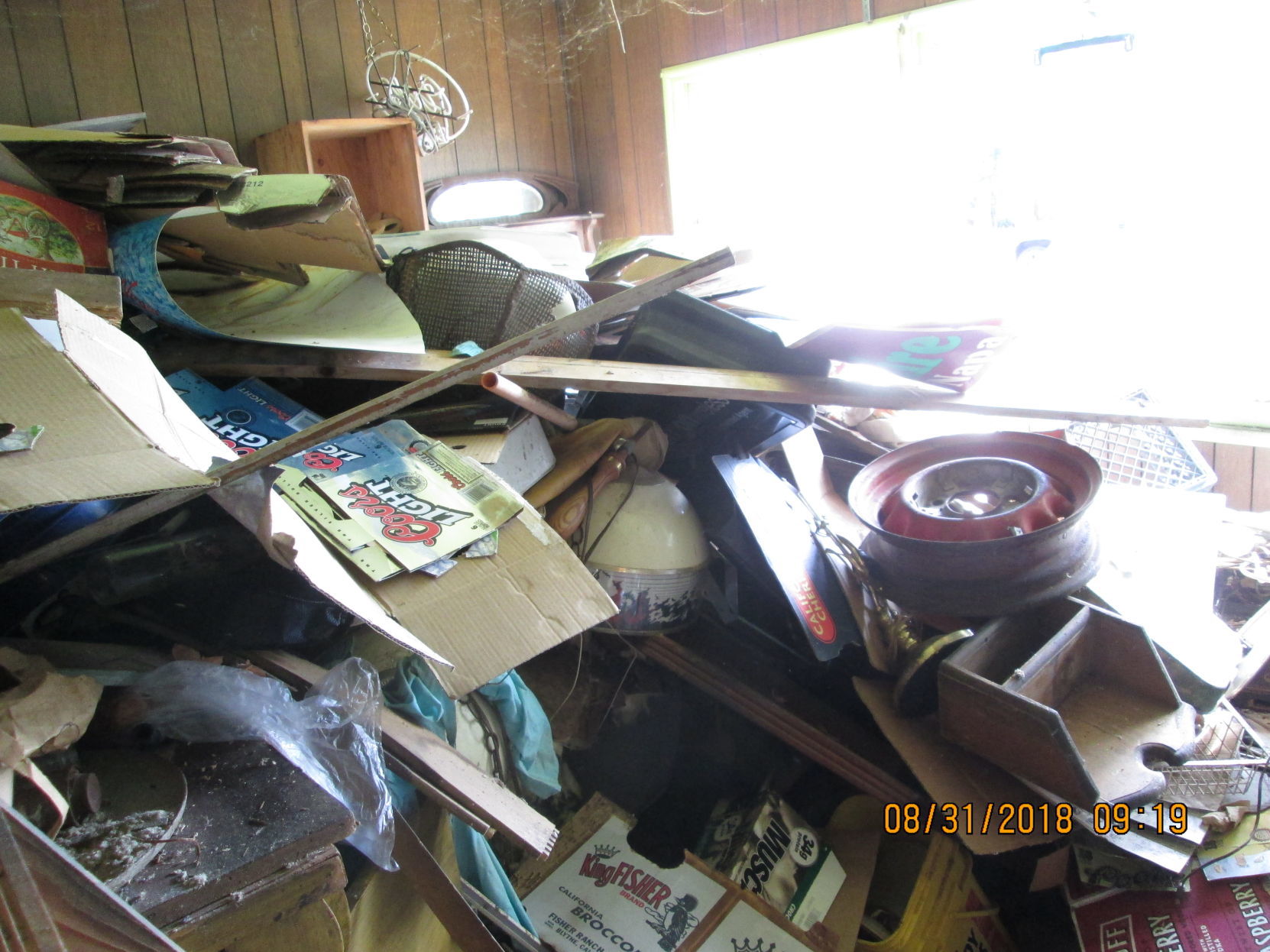 A room filled to the ceiling inside a Napa hoarder house